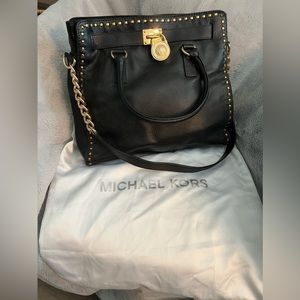 Michael Kors Tote bag for sale gently used comes with white bag as pictured.